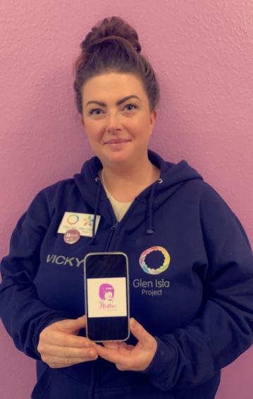 Vicky Petrie, Community Justice Assistant at Angus Council Glen Isla Project showing the Hollie Guard app on a mobile phone