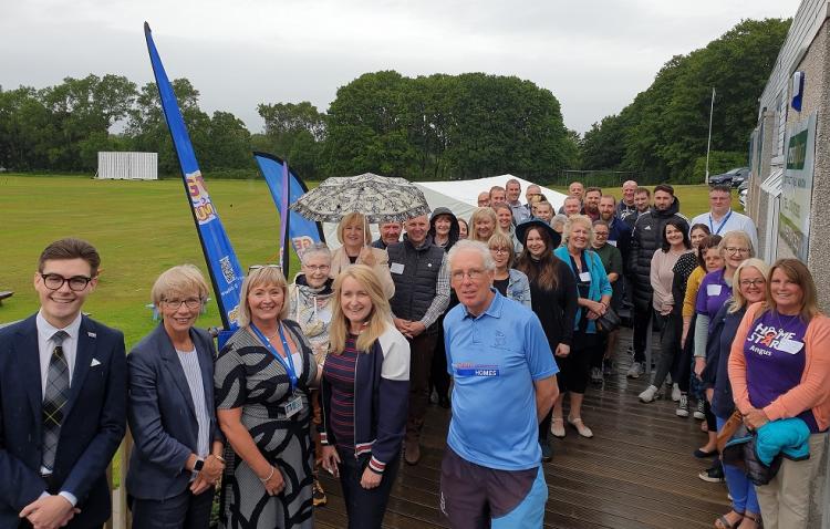 Photo from launch event hosted by Strathmore Cricket Club on Tuesday 28 June 2022 of some of the partners involved, Angus Council staff and elected members (front row Cllr Lloyd Melville, Angus Council’s spokesperson for youth engagement and opportunities; Margo Williamson, Angus Council’s Chief Executive; Dawn Rennie, Angus Council’s Senior Practitioner (Parental and Family Engagement); Kelly McIntosh, Angus Council’s Director of Education and Lifelong Learning and Graham Hewitson, Strathmore Cricket Club)