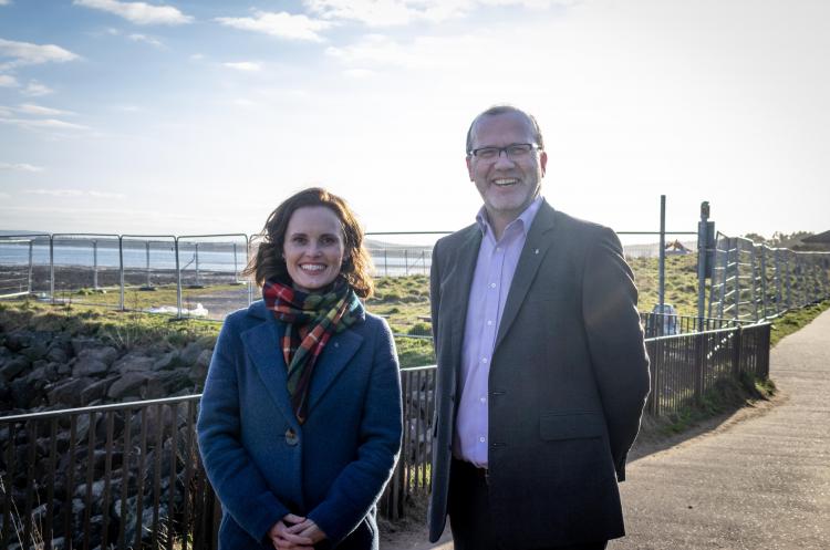 Cllr Mark Flynn, Dundee City Council and Cllr Serena Cowdy, Angus Council standing on the dighty bridge, Monifieth