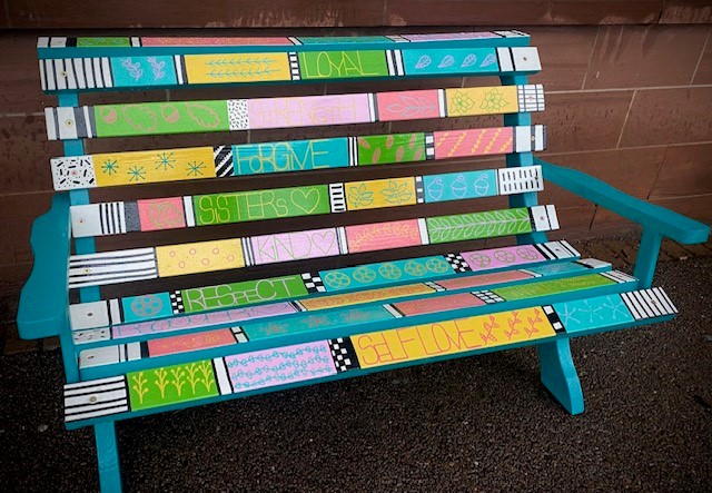 Photo of the colourful bench designed and produced by women from Angus Council's Glen Isla and Glen Clova project