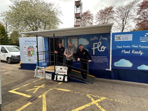 Doug and Derek from the Scottish Flood Forum and Andrew of the Council's Flood and Resilience Team with Flo the Flood Bus